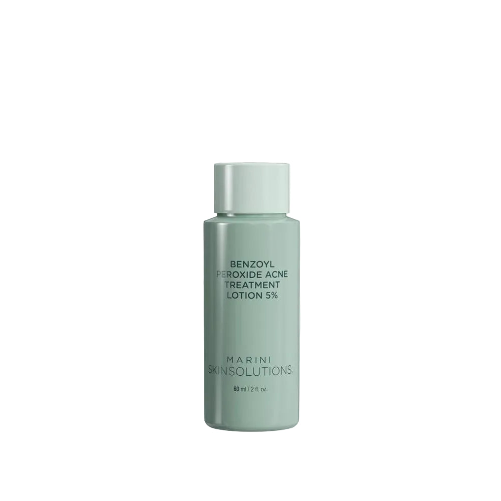 Green bottle of Marini Skinsolutions lotion on a white background