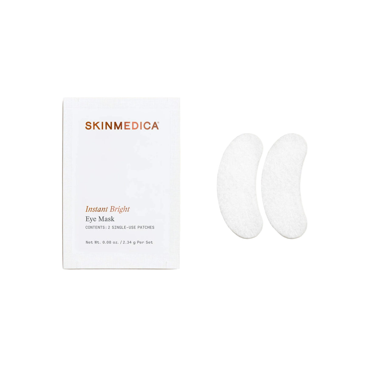 Skinmedica Instant Bright Eye Mask packaging next to two white crescent-shaped eye mask patches on a light beige background.