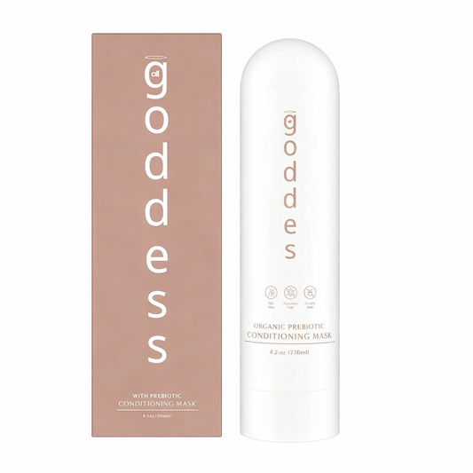 White container and pink packaging of 'goddess all' organic prebiotic conditioning mask on a white background