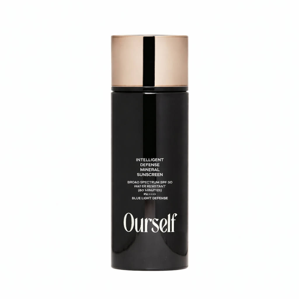 Black sunscreen bottle with rose gold cap on a white background