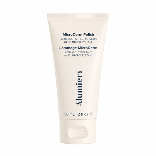 Alumier MD MicroDerm Polish exfoliating facial scrub in a 60 mL cream-colored squeeze tube, shown on a plain white background.