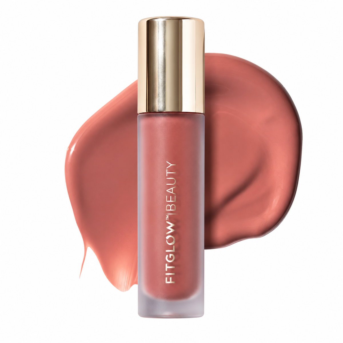 A tube of FitGlow Beauty liquid lipstick in a warm dusty rose shade, featuring a metallic gold cap, set against a matching liquid swatch on a clean white background.