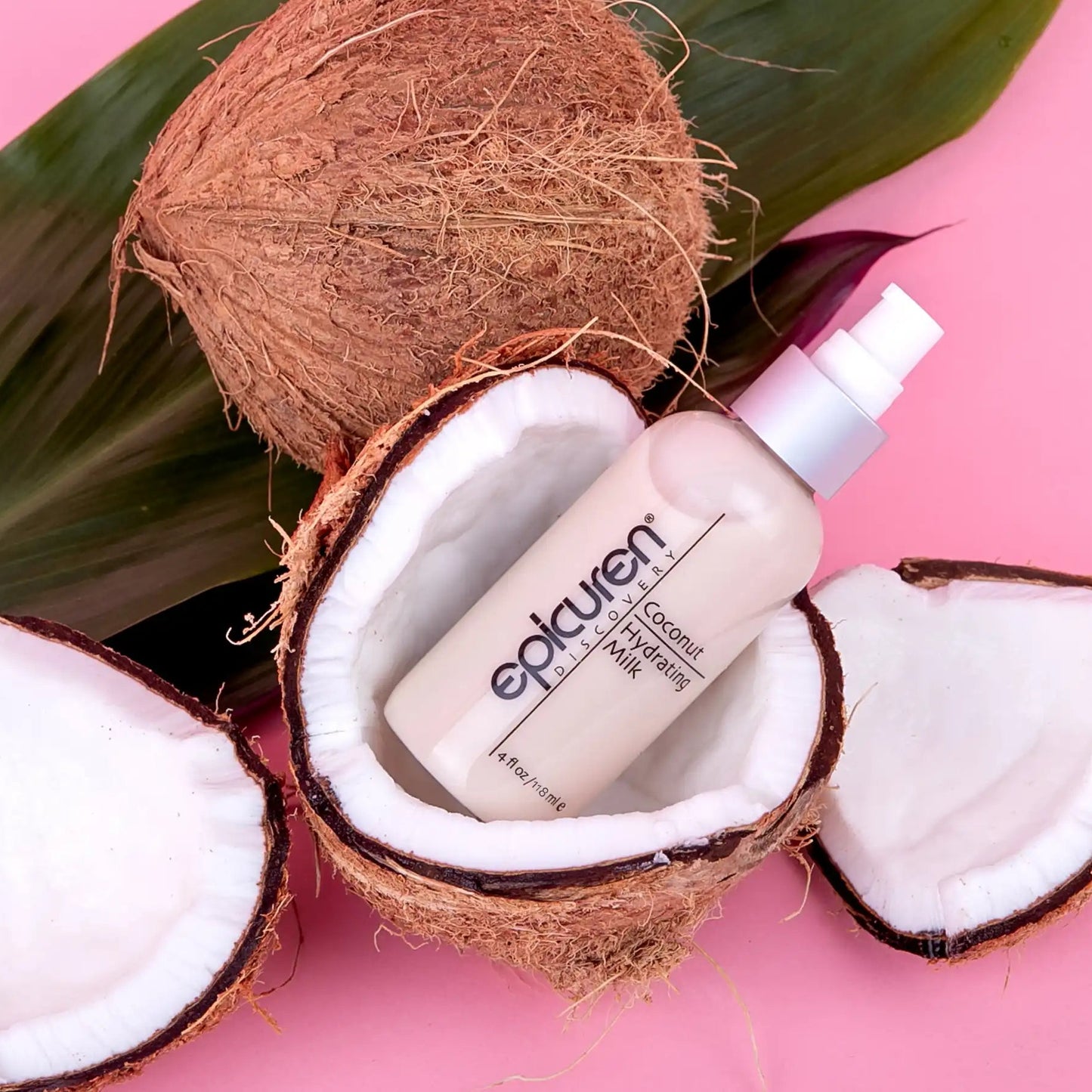 Skincare bottle with 'epocuren' branding inside a coconut on a pink background