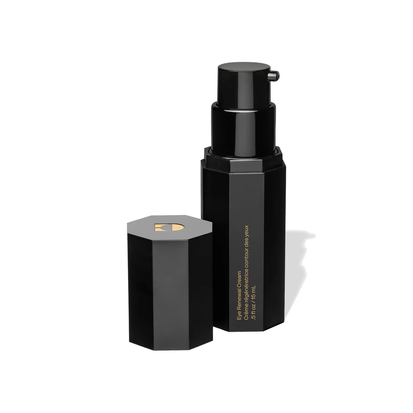 Black cosmetic bottle with cap on a white background