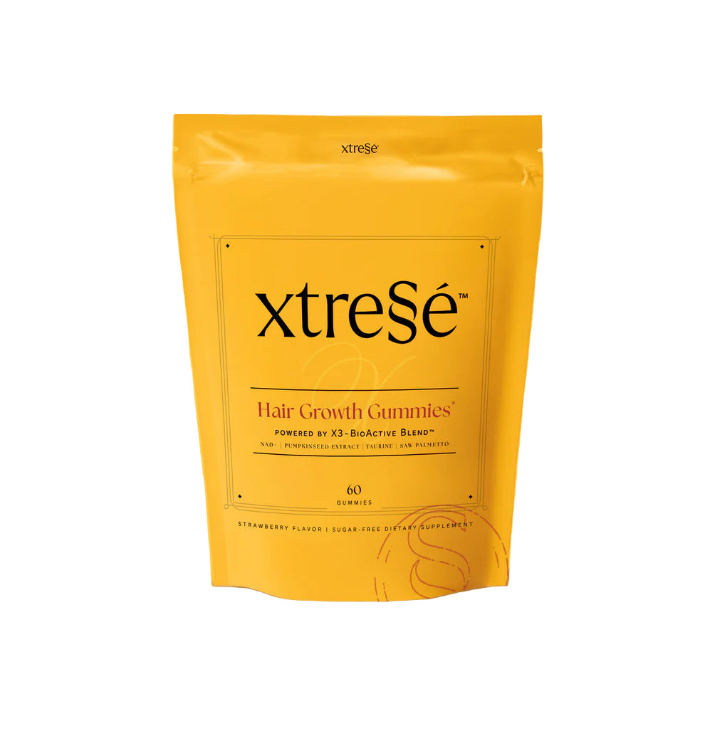 xtreSe hair growth gummies package on a yellow background