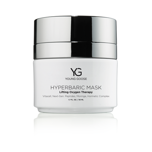 White jar of Young Goose Hyperbaric Mask with silver lid on a white background