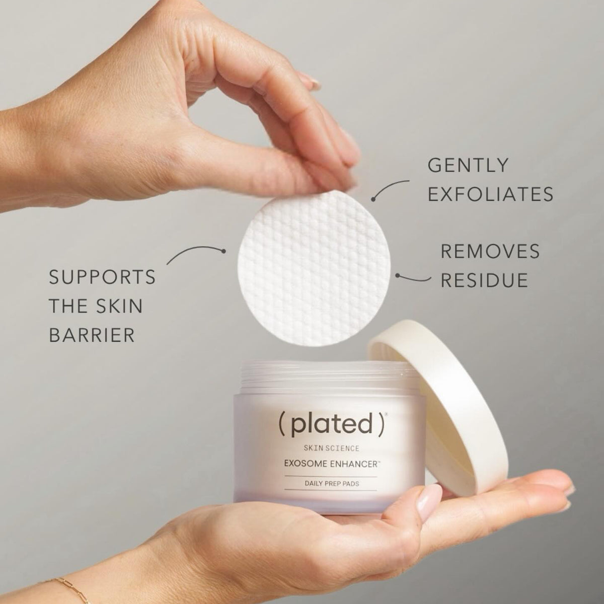 A person's hands hold an open jar of (plated) Professionally Exosome Enhancer Daily Moisturizer next to a white round exfoliating pad, with text callouts explaining the product's benefits against a neutral gray background.