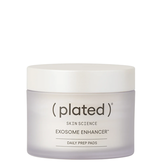 A frosted glass jar of (Plated) Skin Science Exosome Enhancer Daily Prep Pads with a white lid, set against a clean white background.
