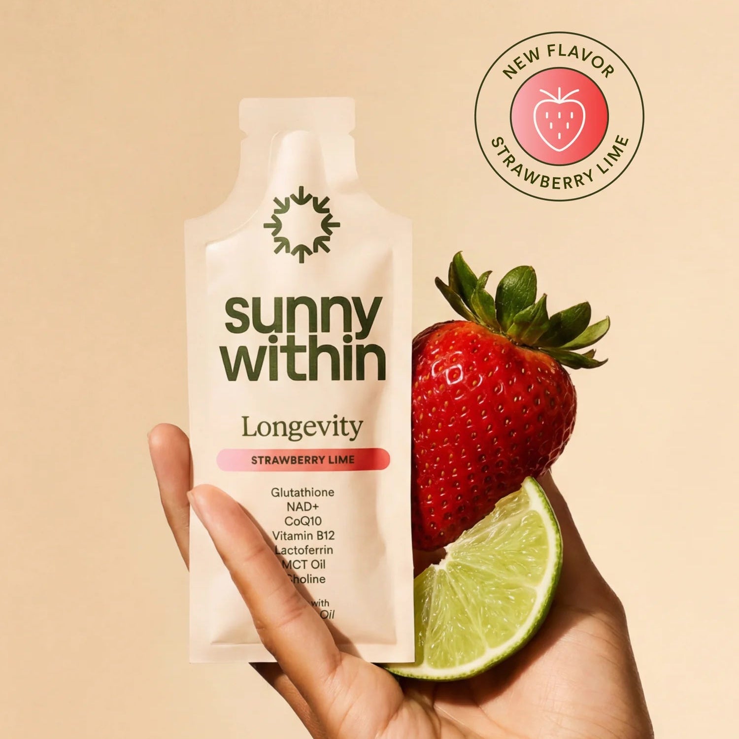 Sunny Within Longevity supplement packet with a strawberry and lime on a beige background