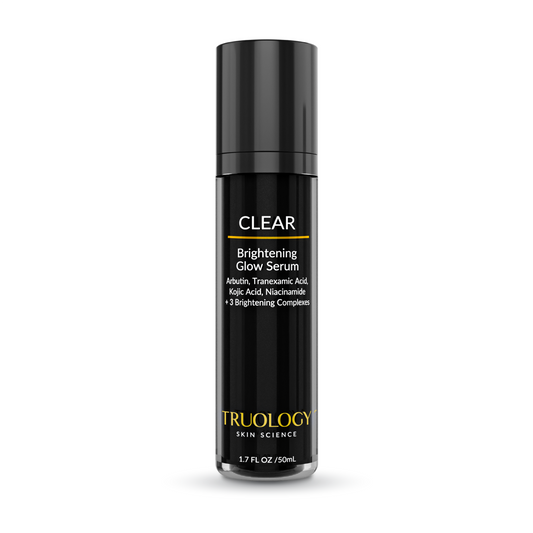 Truology Skin Science Clear Brightening Glow Serum in a sleek black bottle with gold and white text, set against a plain white background.