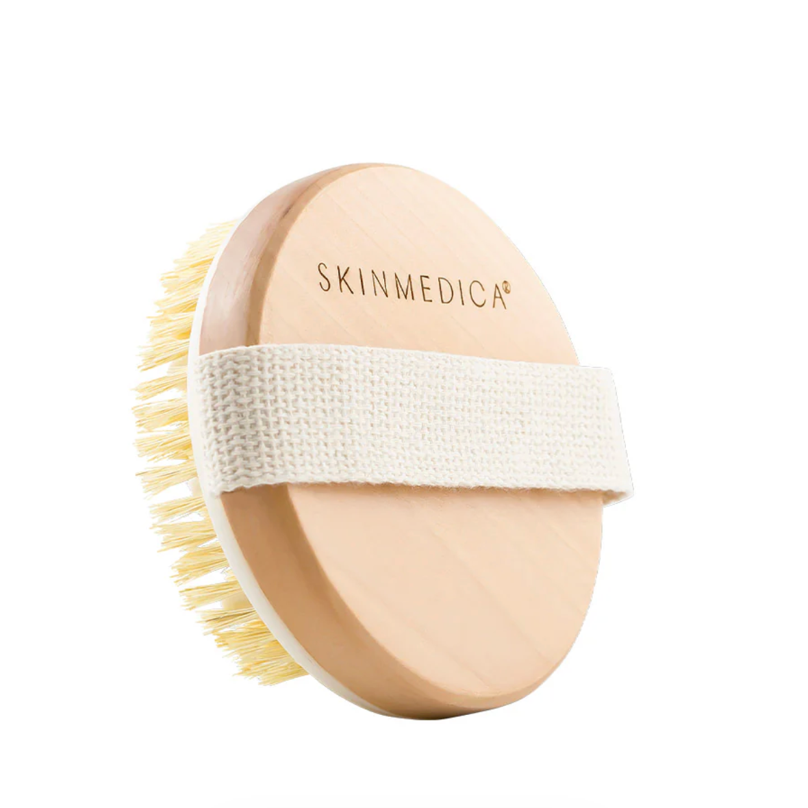 SkinMedica scrub brush with natural bristles on a white background