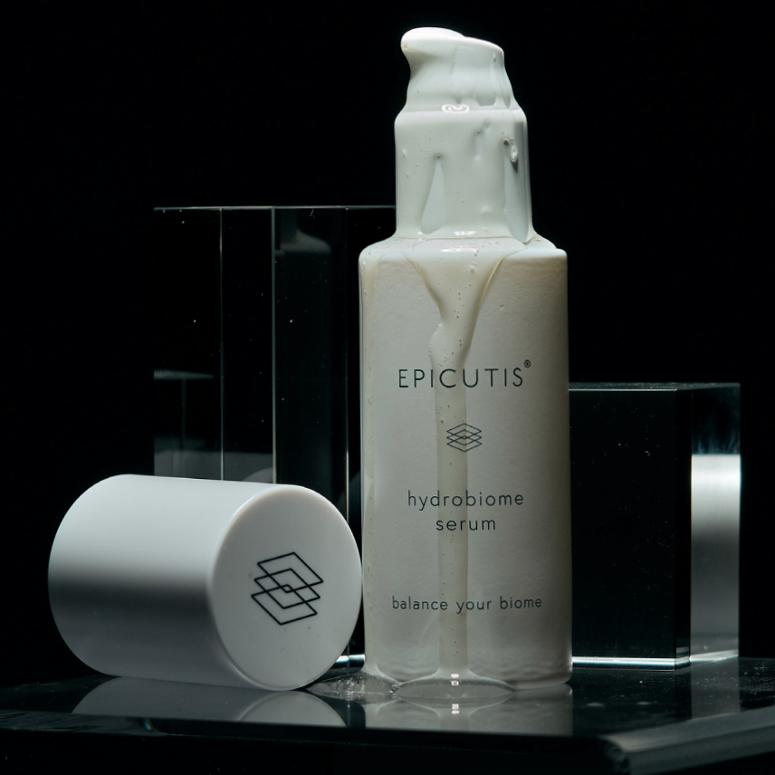 Epicutis hydrobiome serum bottle with cap on a reflective black surface