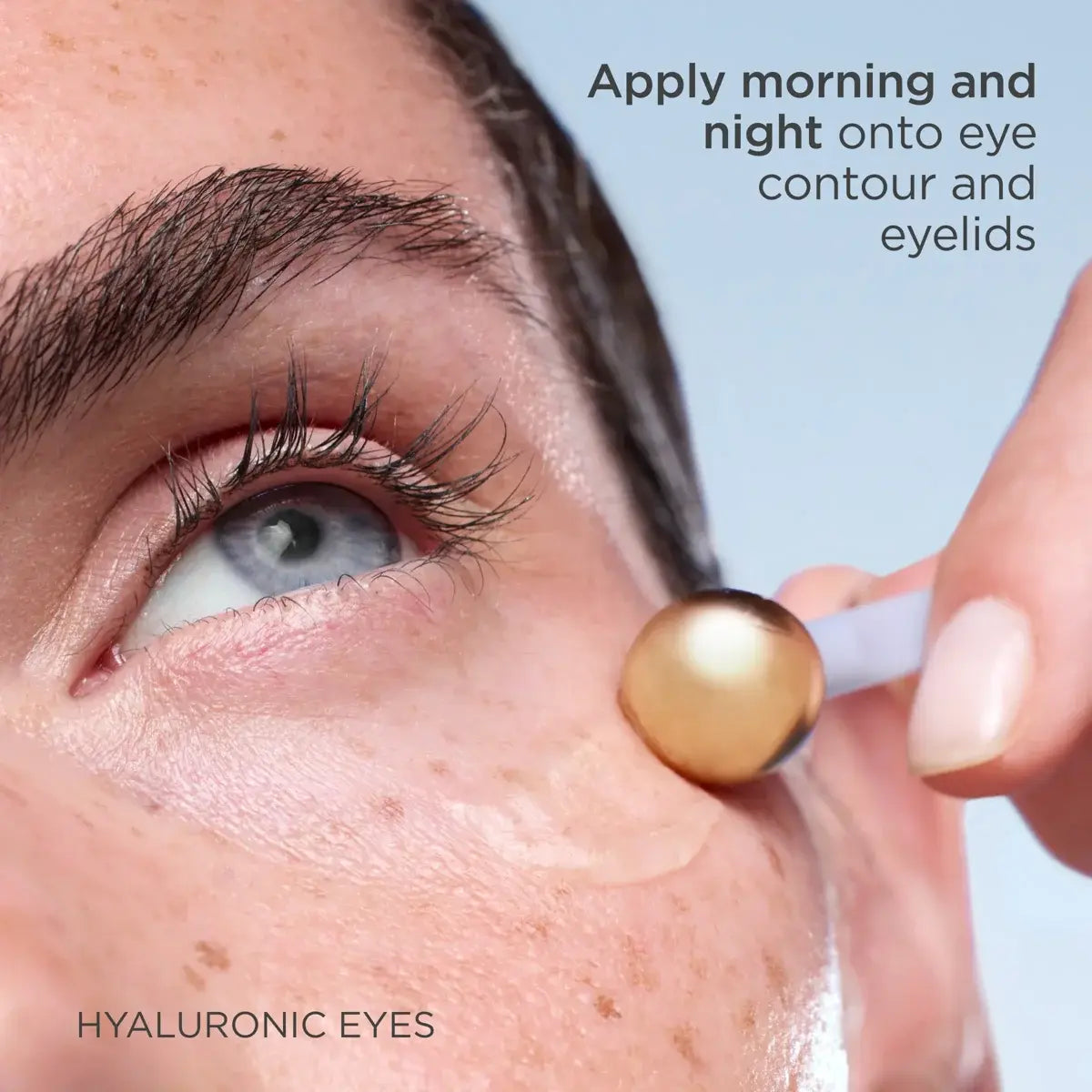 Close-up of a person applying a product to their eye with text about usage.