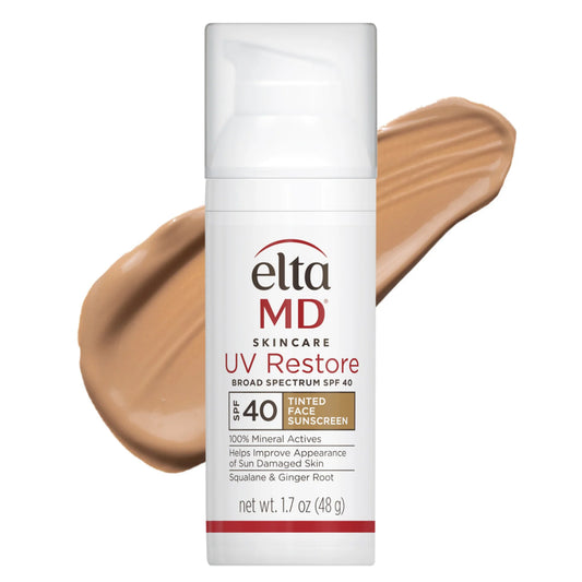 Elta MD UV Restore sunscreen bottle with a swatch of tan color on a white background