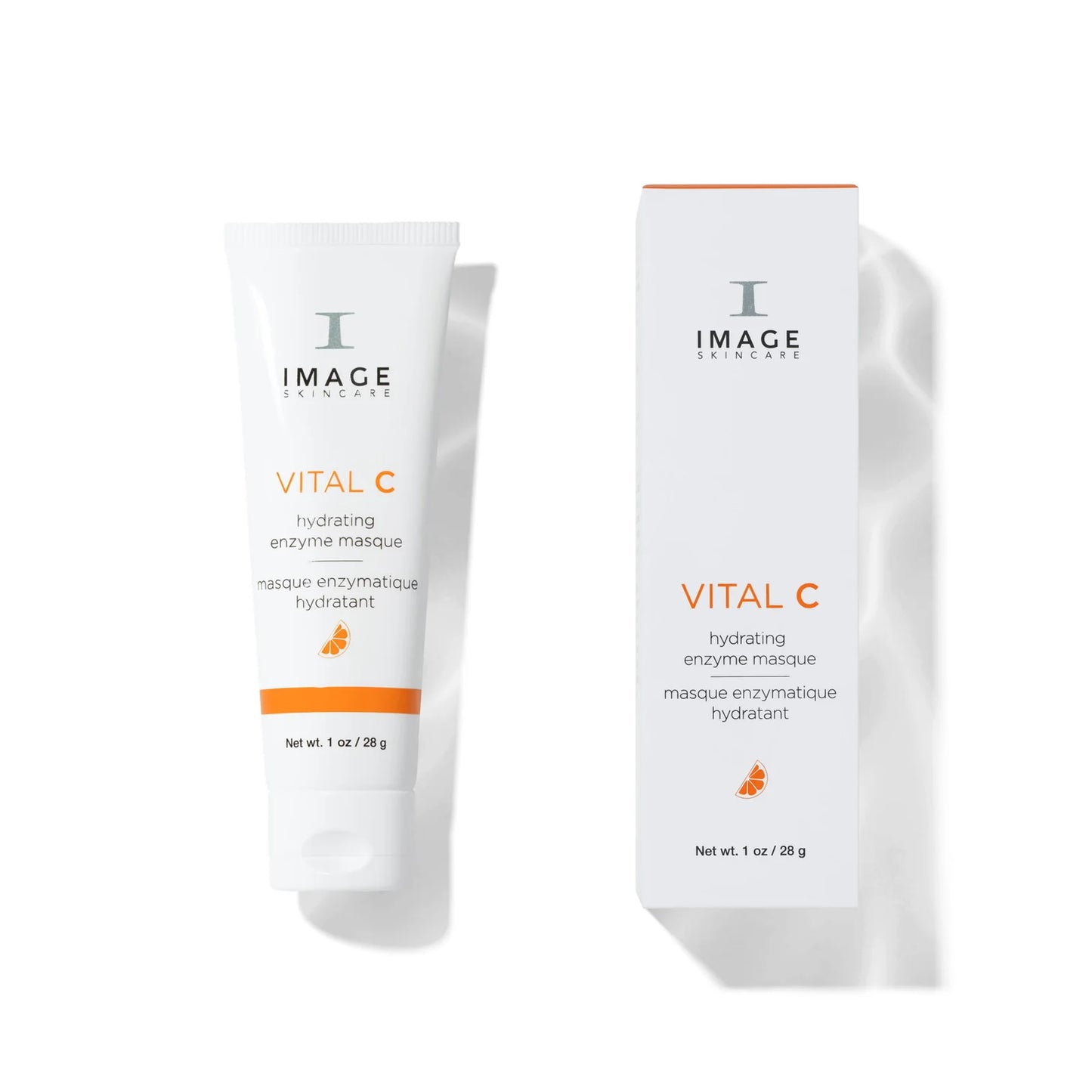A skincare product set featuring a white squeeze tube and its matching outer box, both labeled 'IMAGE SKINCARE VITAL C Hydrating enzyme masque'. The packaging is clean white with orange and dark gray text and accents, set against a plain white background with soft shadows.