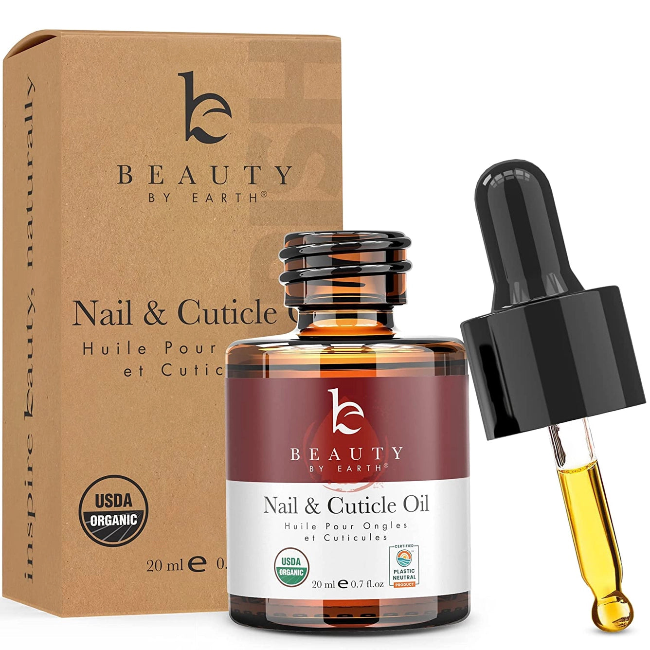 Beauty by Earth nail and cuticle oil with dropper and packaging on a white background