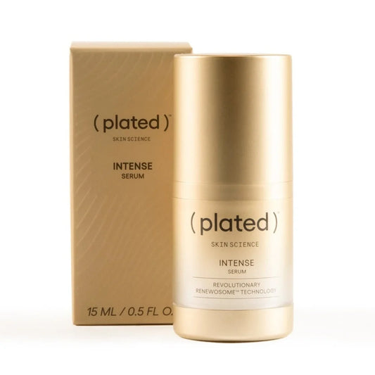 Gold 'plated' Intense Serum bottle and packaging on a white background
