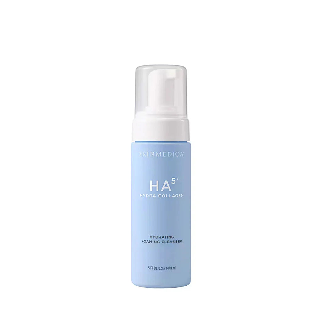 Skincare foam cleanser bottle with white cap on a white background