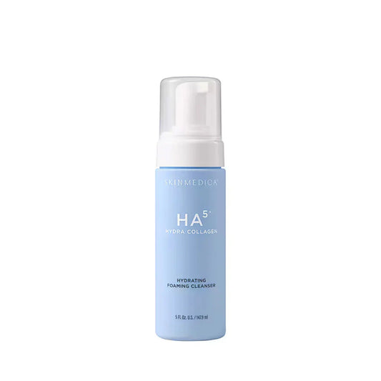 Skincare foam cleanser bottle with white cap on a white background
